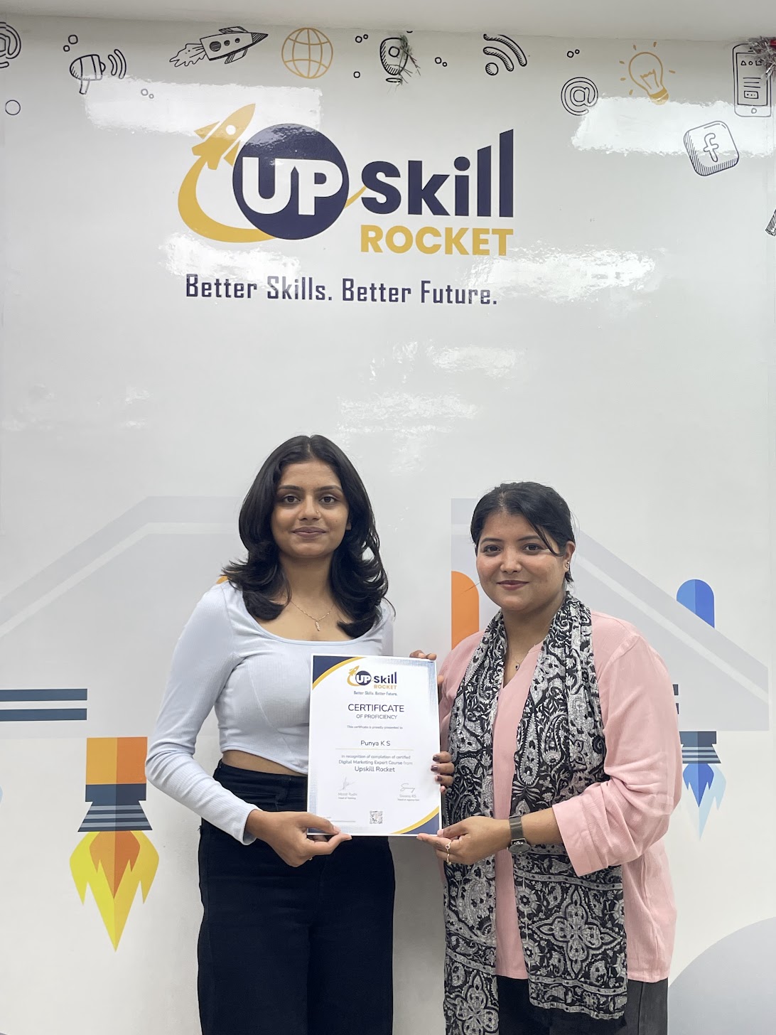 Student receiving her Upskill Rocket digital marketing certificate